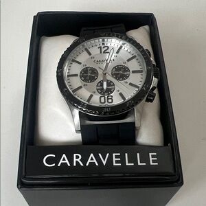 CARAVELLE NEWYORK CHRONOGRAPH SILVER DIAL BLACK BAND WATCH